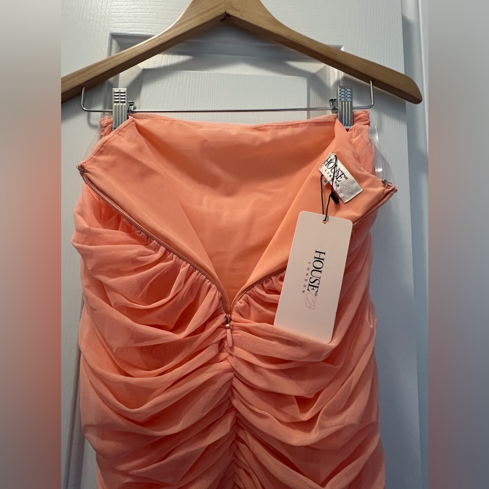 color is peachy pink , beautiful. Tube Top